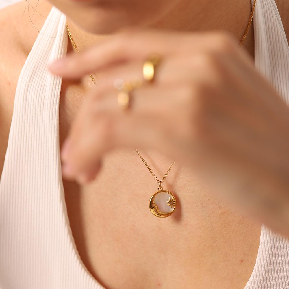 18K Gold Titanium Steel Women's Necklace with French White Mother-of-Pearl Star, Moon, and Round Pendant.