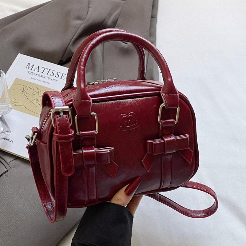 

Популярная корейская версия сумки-саквояжа в милом и крутом стиле, высококлассная портативная женская универсальная модная нишевая дизайнерская сумка-мессенджер