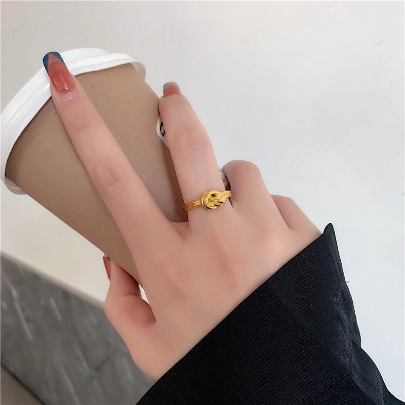 French Designer Titanium Steel Knotted Rope Ring for Women - Fashionable Simple Metal Jewelry