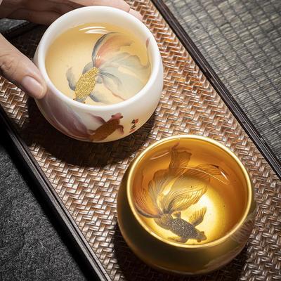 Meisterhaft handgefertigte vergoldete Echtgold Jianzhan Meister-Teetasse Eis-Speck-Jade Porzellan Teetasse Keramik Meistertasse
