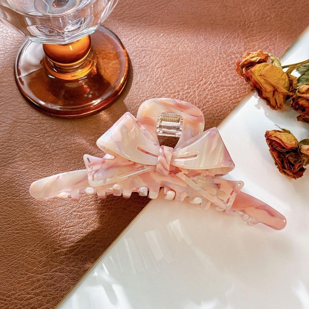 Fashionable Womens Hair Claw Clip In Sophisticated Acetate With Charming Bow Detail