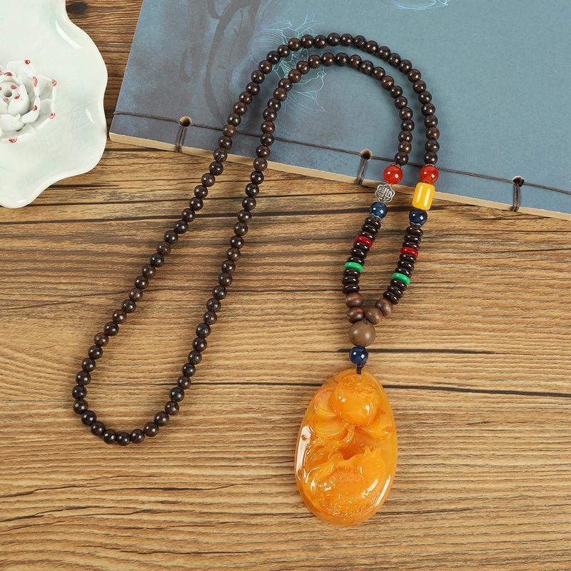 Retro chicken wing wood second generation old beeswax necklace men and women versatile amber pendant long sweater chain pendant