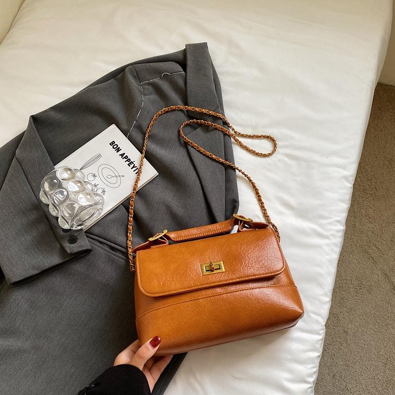 

Korean version of fashionable simple retro small bag women s 2025 new autumn messenger bag high value handbag small square bag