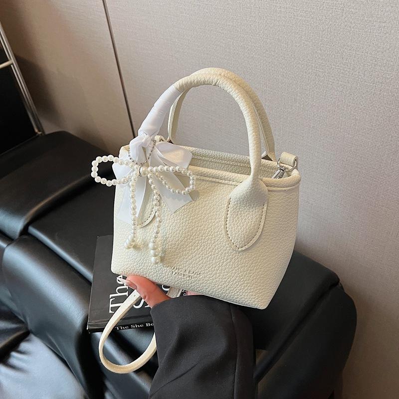 Niche design portable bucket bag women's 2025 new spring and summer bag shoulder messenger bag tide