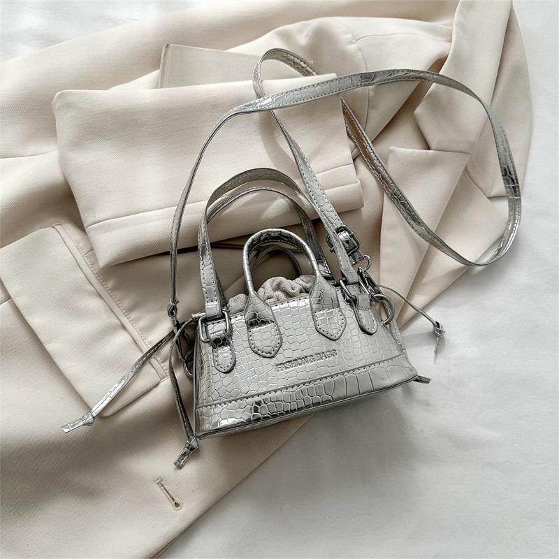 Niche design small bag women's spring new fashion simple hand bag casual commuter messenger bag women's bag