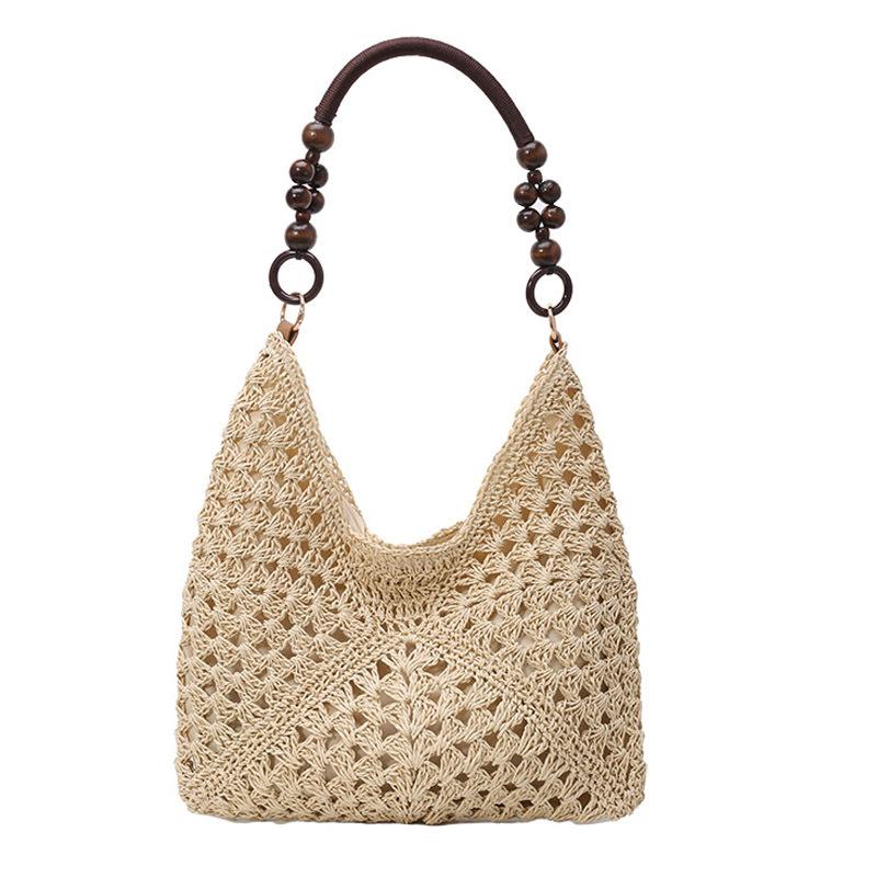 Summer fashion bag women 2025 new seaside beach hollow shoulder bag portable woven tote bag
