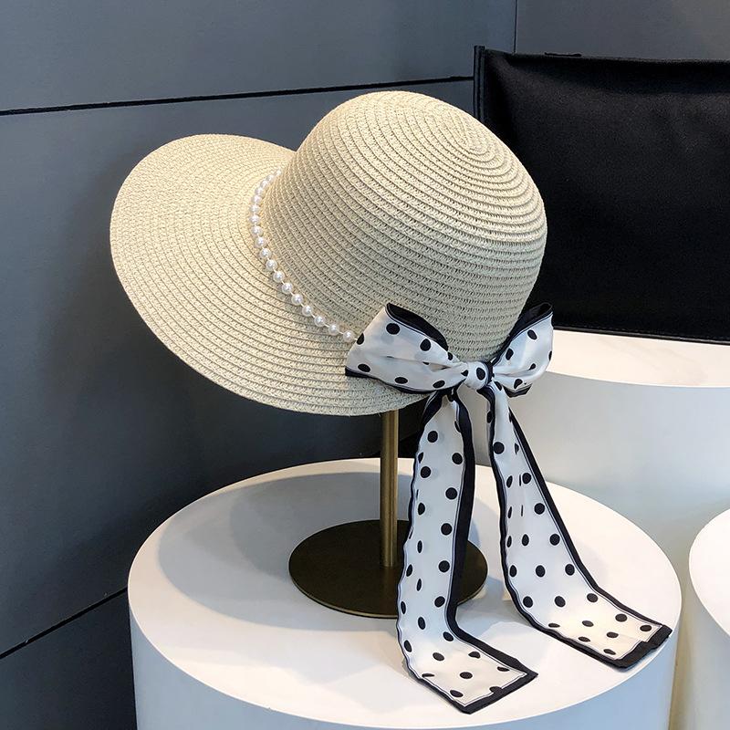 Elegant Pearl Bowknot Sun Hat for Women - Wide Brim, UV Protection Straw Bucket Cap with Chic French Style Design