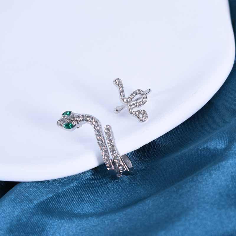 

Трехмерные золотые серьги-каффы в виде змеи с цирконием серебряный