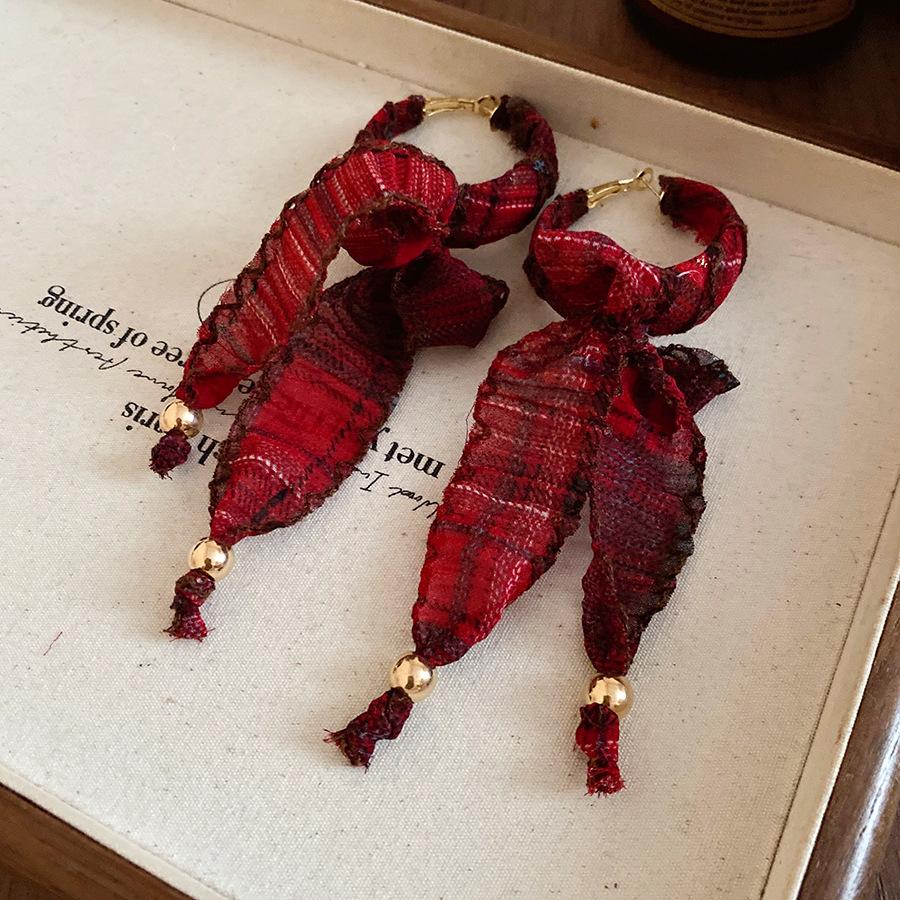 Silver needle fabric bow fringed earrings ethnic style retro temperament earrings light luxury high-end earrings women