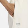 Nike Pantaloni da tuta casual affusolati a maglia a vita alta con coulisse e logo ricamato da donna Avorio chiaro FD5502-110