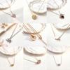 Rotating Pendant Titanium Steel Necklace for Women - Retro Kissing Chain Bouncing Collarbone Style