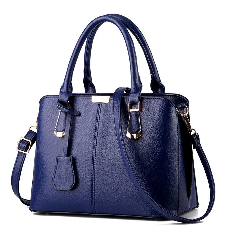 Women's bag generation leather large-capacity locomotive bag high-end simple platinum handbag