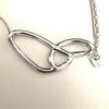Used Good conditionSWAROVSKI Swarovski double oval necklace crystal silver color storage bag included
