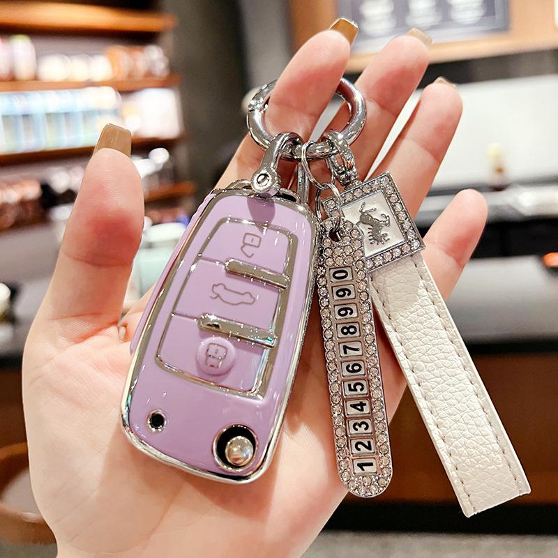 Chery Key Case for Tiggo 3x, Arrizo 5, and QQ Ice Cream - High-End Protective Shell with Buckle for Women.