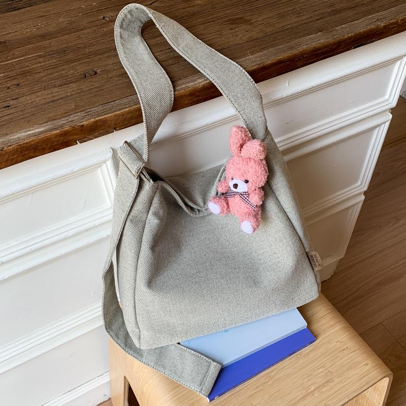 

Summer canvas bag women s new versatile shoulder messenger bag large capacity tote bag class bag сірий колір