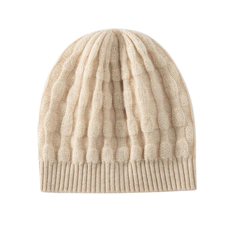 Dammössa med flätstickning i ren kashmir för öronen, för höst- och vintermode