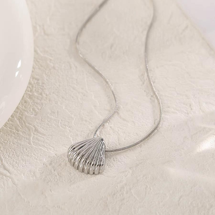 

Модное 3D стереовентиляторное ожерелье из титановой стали в форме ракушки