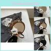 Trendy Casual Round Crossbody Bag For Women With Stitch Detailing In Beige