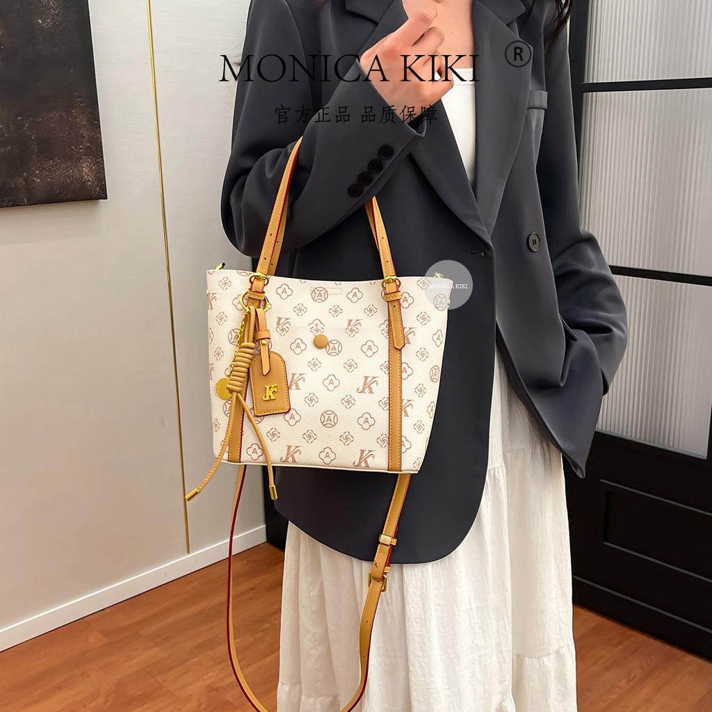 Monica Qiqi single shoulder oblique span bag female foreign versatile multi-layer portable high-end textured bag large capacity fashionable