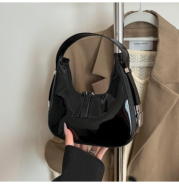 

2025 spring and summer new women s Korean niche design handbag patent leather glossy women s bag fashion shoulder bag underarm bag чёрный