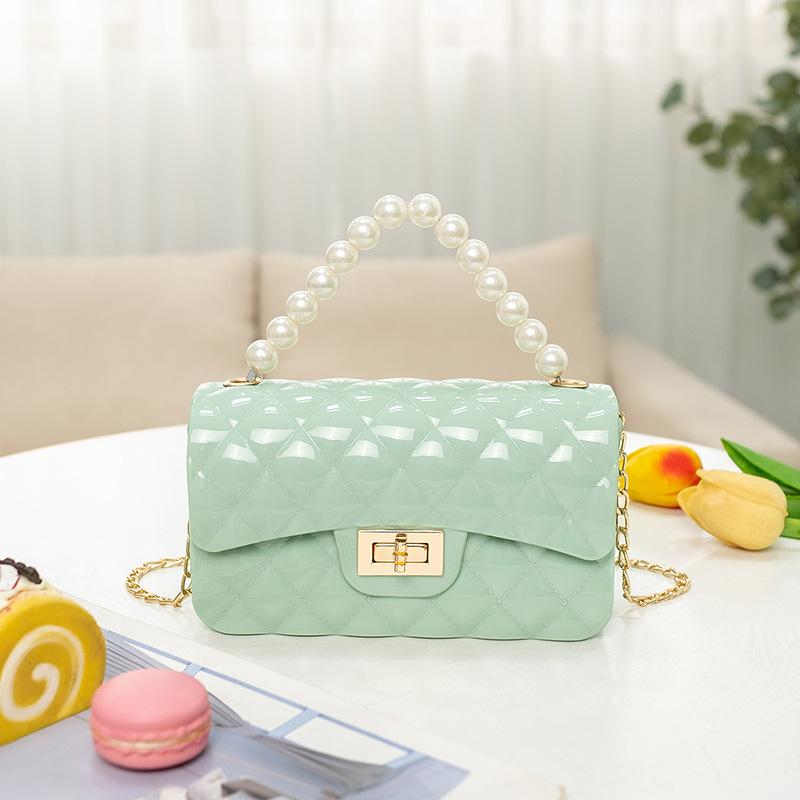 Fashion pearl shoulder jelly bag, women's versatile diamond lipstick change bag, one piece.