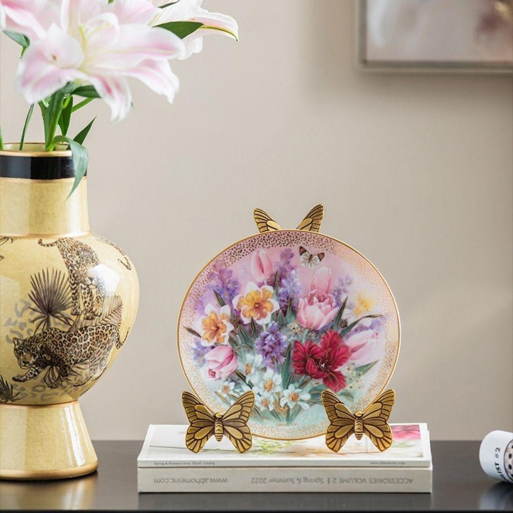 Leichter Luxus Stil Schmetterling Zink Zinklegierung Plattenständer Eleganter Tischplatten-Displayständer Teller-Display