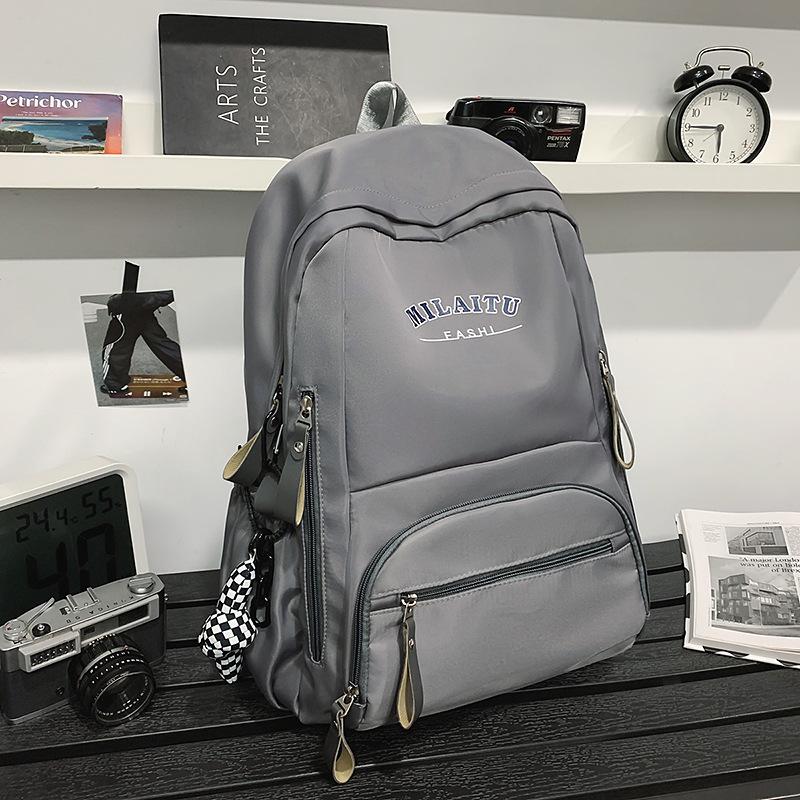 Large capacity simple schoolbag high school student backpack casual college student couple backpack