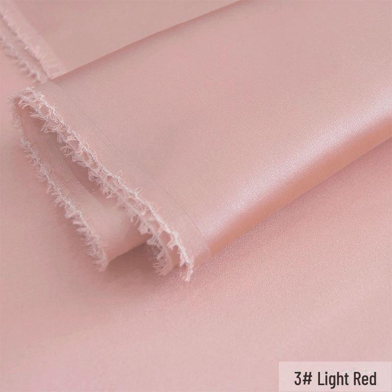 

Тканина Huahong 19 Momme Silk Atlas Crepe, ширина 114 см, 100% шовк тутового кольору, однотонна фарбована