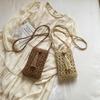A Stylish Single-shoulder Crossbody Bag Made of Hollow-woven Fabric, Perfect for Carrying Your Phone.