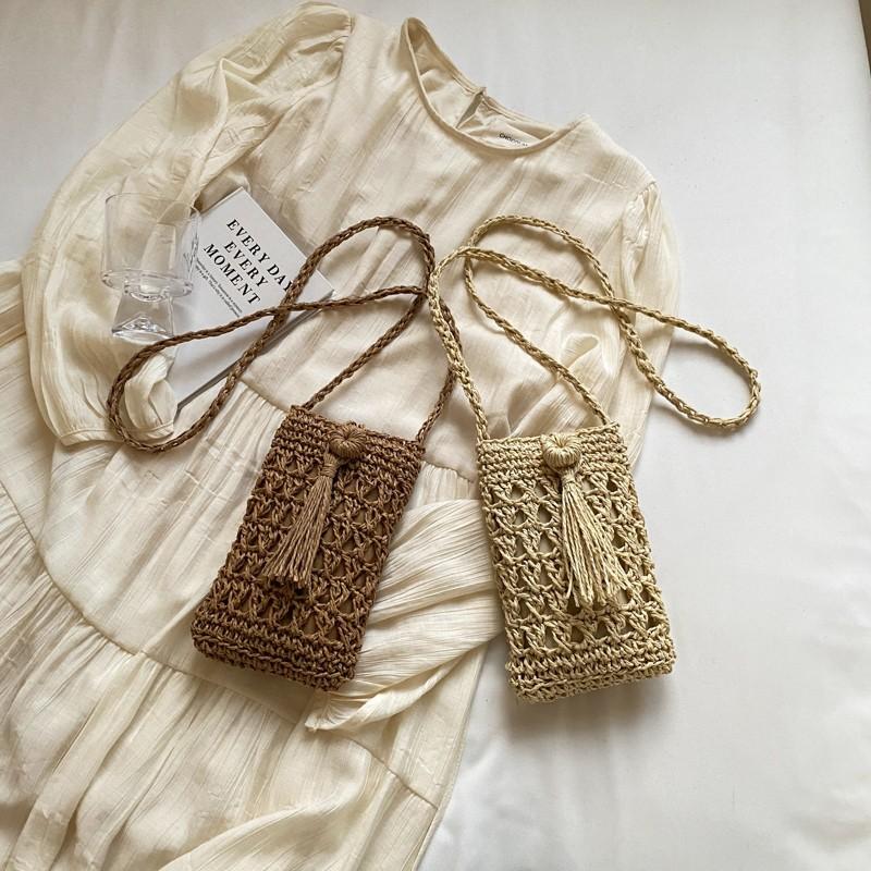A Stylish Single-shoulder Crossbody Bag Made of Hollow-woven Fabric, Perfect for Carrying Your Phone.