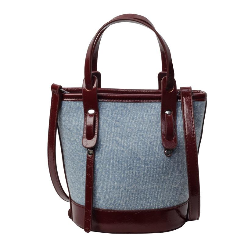 Popular contrasting color bucket bag women's new small bag fashionable portable shoulder bag textured messenger bag