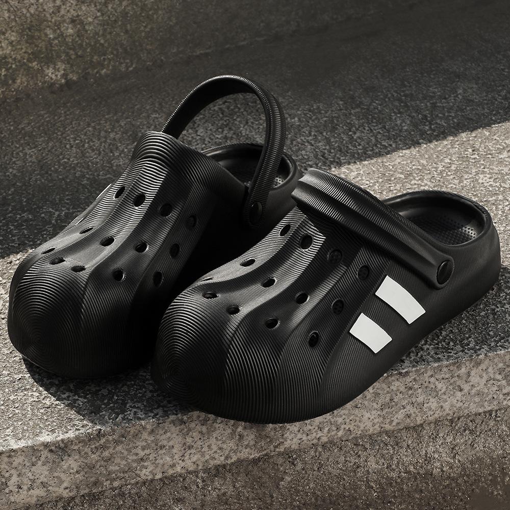 

мода 2024 летние мужские тапочки модные туфли с толстым дном сандалии из ЭВА противоскользящие тапочки Baotou уличные пляжные женские садовые туфли 44-45 чёрный