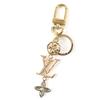 Excellent Key Ring LV Wonder of the Sea Bag Charm Gold M01650 Used