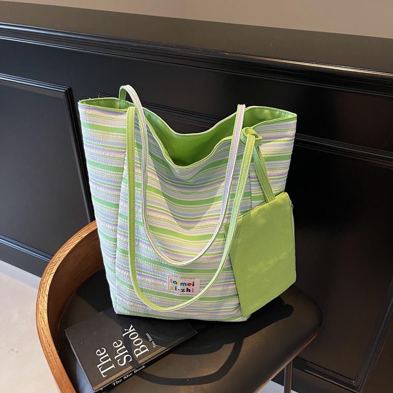 Korean version of casual large-capacity underarm bag women's 2025 new striped canvas bag double-sided back shoulder bucket bag