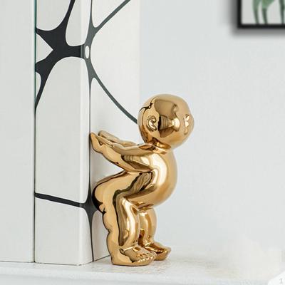 Ceramic Little Man Sculpture Book End Golden Color Anti Skid Bottom 10.2x8.8x17cm Desktop Ornament