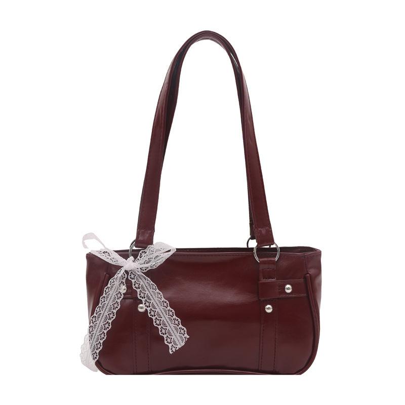 French niche bag women's new bow pillow bag shoulder messenger bag portable baguette bag