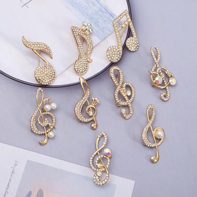 Broche de lujo con forma de ramillete y nota musical creativa, accesorio de vestir completo para mujer, joyería brillante para traje