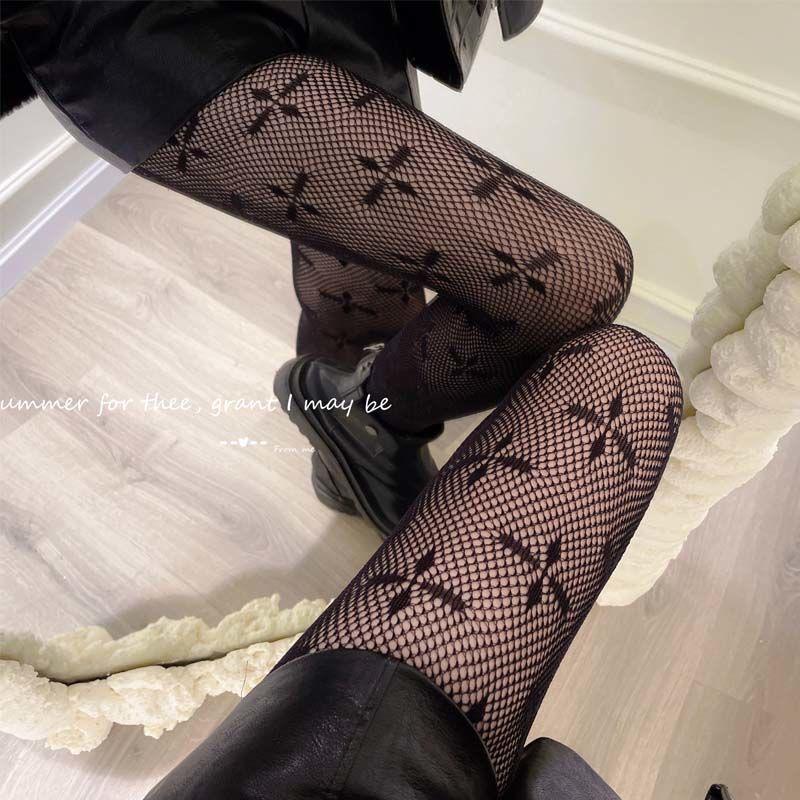 Net Celebrity Style Four-Leaf Clover Fishnet Stockings - Black Silk Pantyhose for Spring and Autumn.