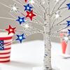 Independence Day LED Star Tree Decoration 18/24-Inch Patriotic Tabletop Light with 24 Red White Blue Stars 8 Modes Timer USB & Battery Powered 4th of