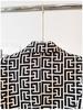 2025 European & American Celebrity Women's Slim Fit Double-Breasted Geometric Jacquard Suit Jacket with Lion Buttons.