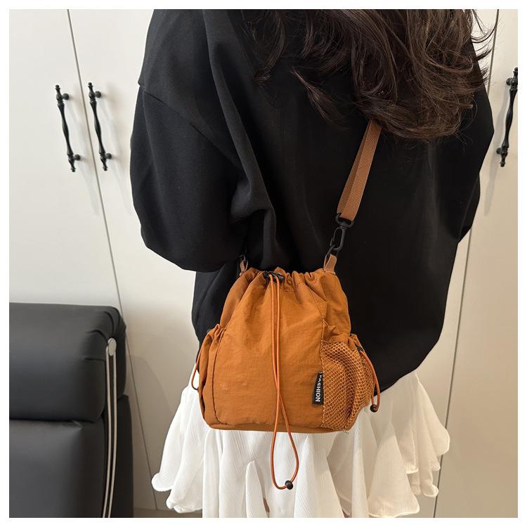 Waterproof Nylon Drawstring Bucket Bag for Women 2026 Trendy Minimalist Shoulder Crossbody Purse