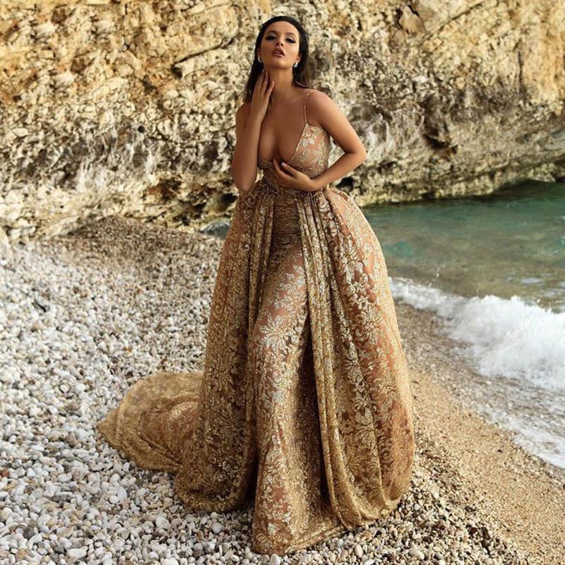 Europa, América, el nuevo vestido de mujer Dunhuang sexy con tirantes y escote en V dorado vestido largo primavera