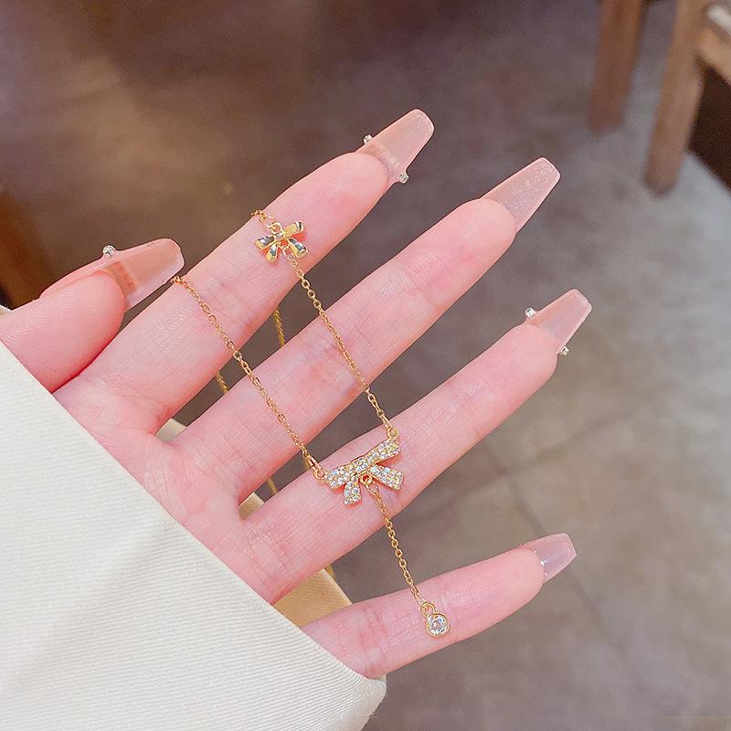 Leichter Luxus Nischen Perlenhalskette Damen Vielseitige High-End Schmetterling Titanstahl Schlüsselbeinkette Halskette