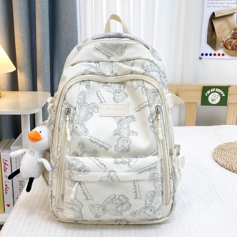 School bag for female junior high school students, simple and versatile printed bear niche design, college student computer backpack tide