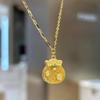 Women's Gold Fortune Bag Pendant Necklace with Lace Hollow Design