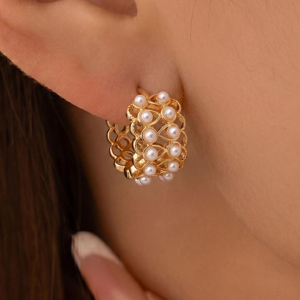 Elegant French Retro Pearl Hoop Earrings with Unique Hollow Metal Design