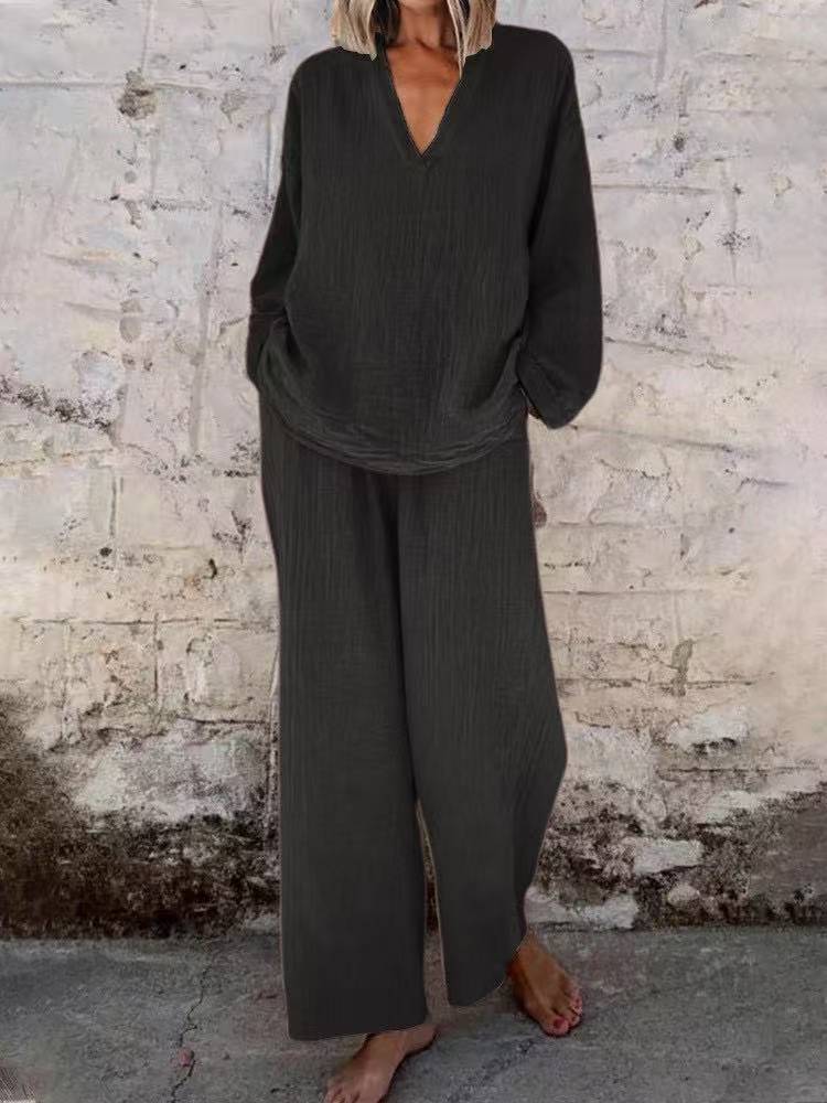 

Женский комплект для отдыха цвета нежно-розовый, топ с V-образным вырезом и брюки широкого кроя S чёрный