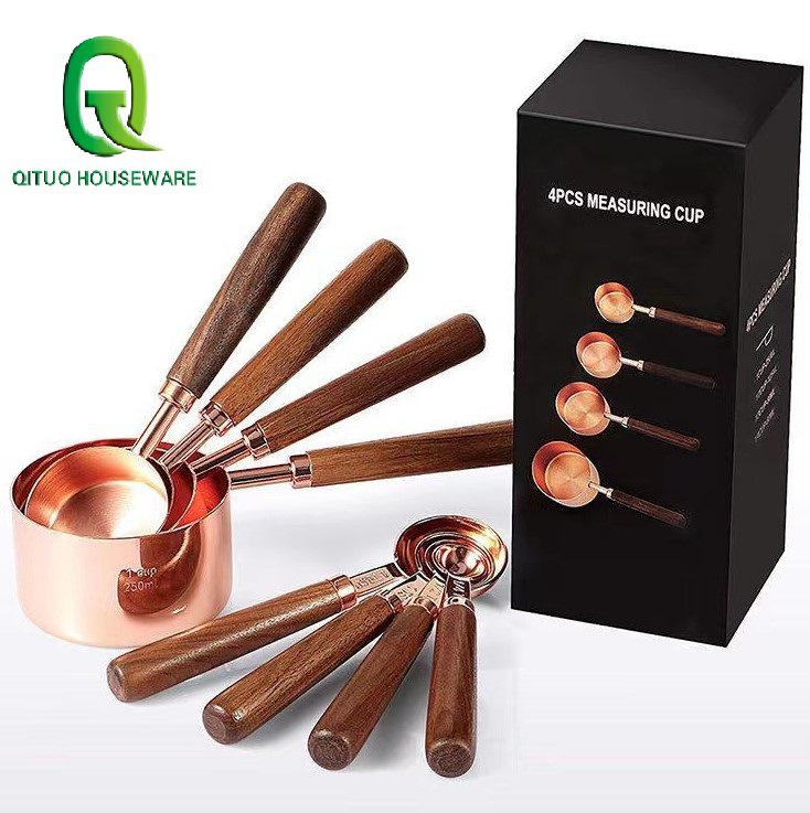 Gold-Plated Stainless Steel Measuring Cups & Spoons with Solid Wood Handles and Scale Markings for Baking.