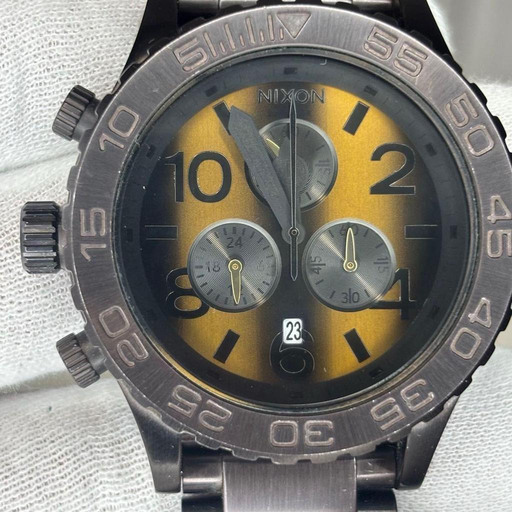 Used Rare translation NIXON Tiger Eye 42-20
