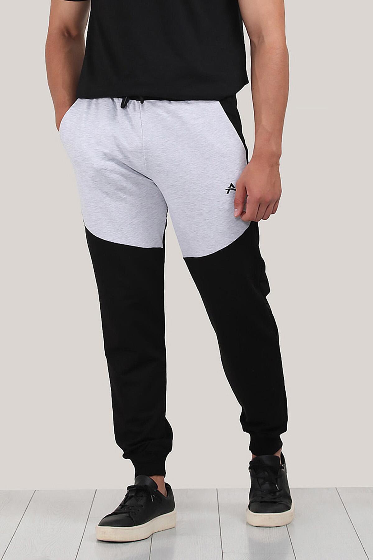 

Мужские спортивные штаны с манжетами